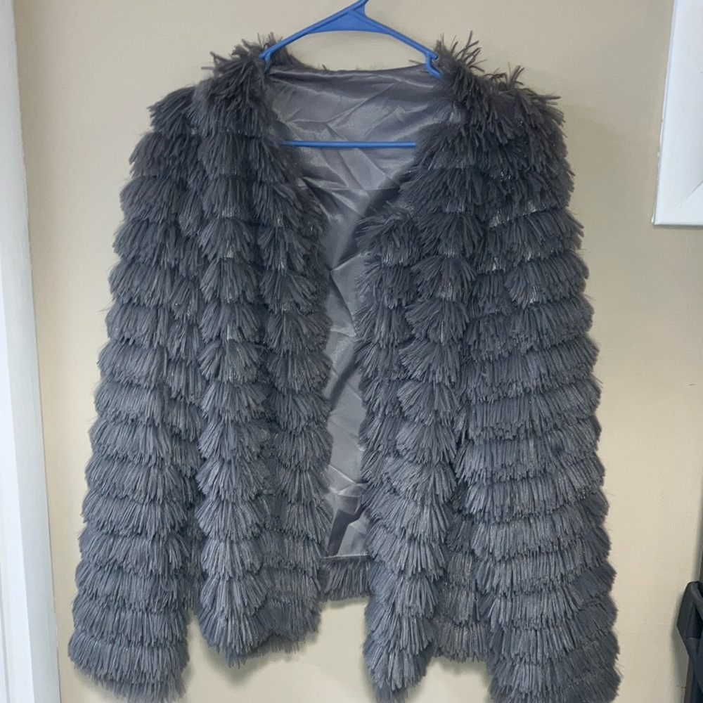 Unbranded. Possibly Avon Lg. Gray shimmer.